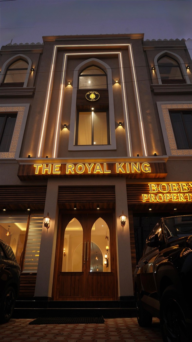 THE ROYAL KING hotel building entrance with ornate arched doorway and warm lighting in Ludhiana